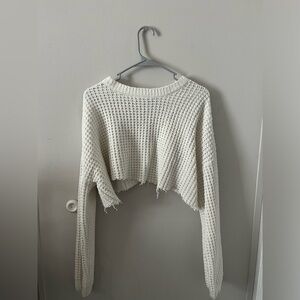 White cropped sweater.